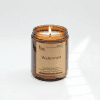 Scented candle in amber jar