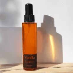 Amber body mist bottle with label
